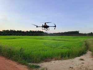 Industrial agricultural drone flying over a field, representing Swindon’s growing drone industry, innovation economy and investment potential